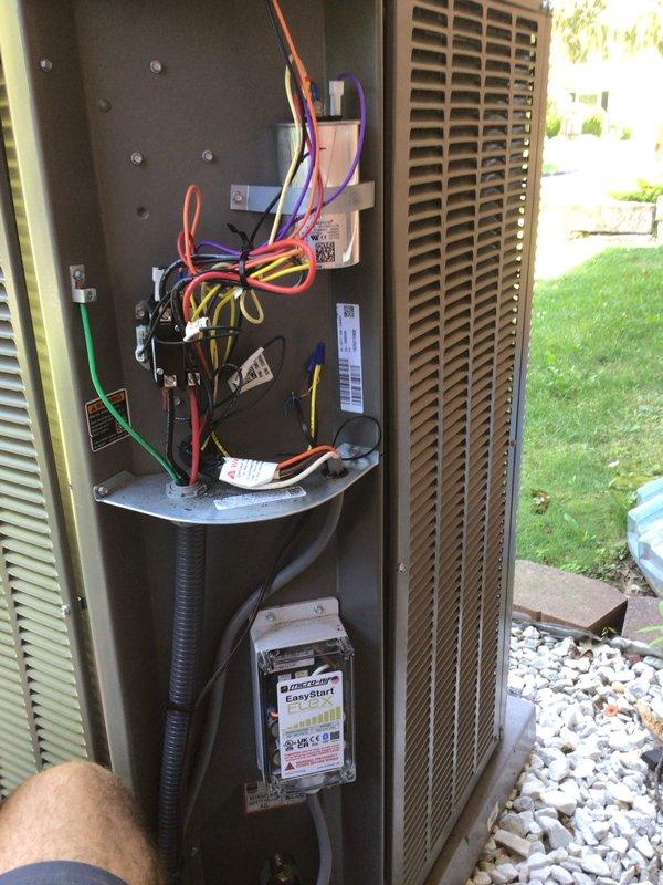 Responded to no-cooling complaint on one-year-old Lennox air conditioning unit. Upon inspection, discovered severe electrical corrosion on contactor terminals and connection points affecting unit operation. Cleaned corroded terminals, verified proper electrical connections on low-voltage control wiring and contactor assembly, and confirmed EasyStart device functionality. Tested system operation and restored cooling capacity. Documented equipment condition with photos for warranty reference.