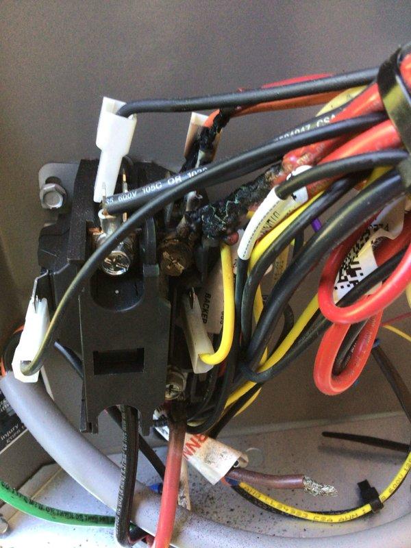 Responded to no-cooling complaint on one-year-old Lennox air conditioning unit. Upon inspection, discovered severe electrical corrosion on contactor terminals and connection points affecting unit operation. Cleaned corroded terminals, verified proper electrical connections on low-voltage control wiring and contactor assembly, and confirmed EasyStart device functionality. Tested system operation and restored cooling capacity. Documented equipment condition with photos for warranty reference.