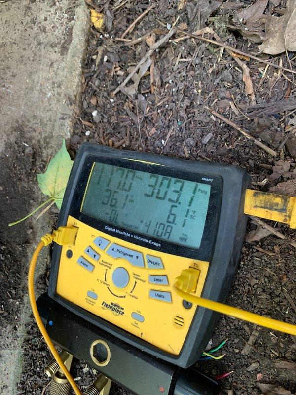 Responded to no cooling complaint on ground-mounted unit U10. Found condenser fan motor not operating while compressor was running. Diagnosed failed dual run capacitor using digital manifold gauges and visual inspection of electrical components. Replaced TITAN PRO TRCFD355 capacitor rated at 440/370 VAC. Verified all electrical connections secure, tested system operation, and confirmed condenser fan motor and compressor both cycling properly with correct amperage draw. Unit cooling normally upon departure.