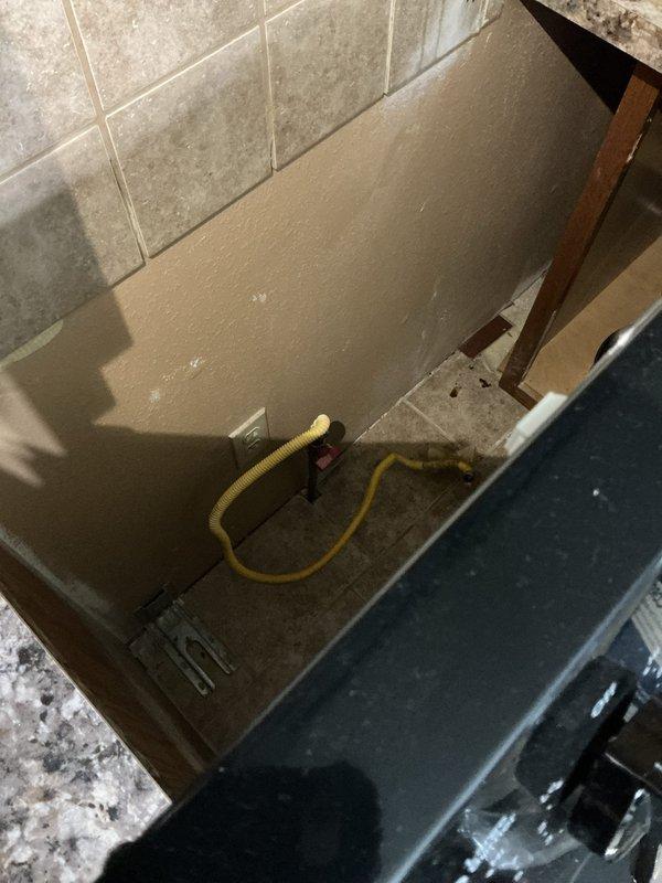 Conducted electrical estimate for breaker panel upgrade to accommodate conversion from gas range to electric range. Assessed existing panel capacity and determined requirements for installing proper 240V circuit with dual 20-amp breakers to replace current inadequate 110V outlet behind range location.