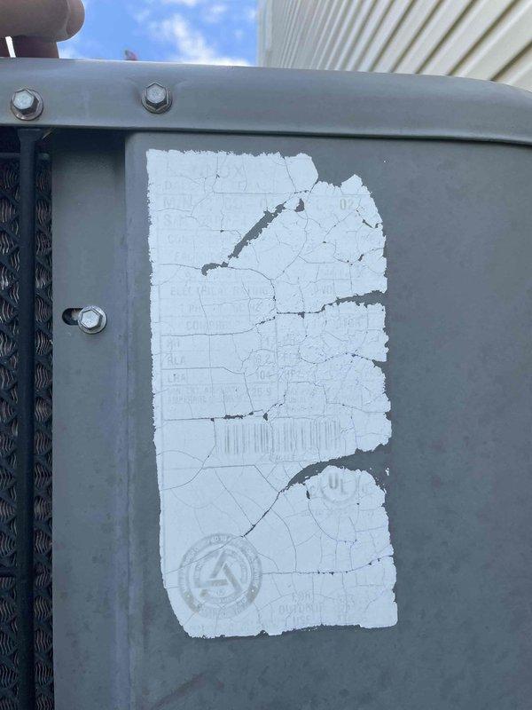 Responded to no-cool service call for single outdoor unit system over 10 years old struggling to maintain 69-degree setpoint with indoor temperature at 76 degrees. Upon inspection, discovered extensive ice buildup on evaporator coil with restricted airflow through aluminum fins. Documented frozen coil condition and observed significant corrosion on drain pan and housing components indicating long-term moisture exposure issues. Advised customer to turn AC off and leave fan on to allow coil to thaw completely. System requires further diagnosis after thaw cycle to determine root cause of freezing condition, which may include low refrigerant charge, restricted airflow from dirty filter or blower issues, or failing metering device.