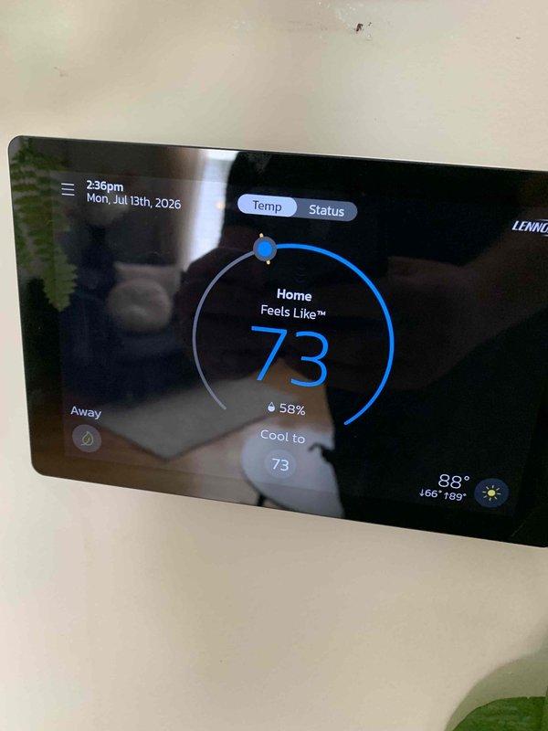 Responded to callback for unit not reaching setpoint despite cooling operation. Upon arrival, verified Lennox thermostat was actively cooling with Feels Like™ feature and dehumidification mode engaged. System was maintaining 73°F with outdoor temperature at 88°F and indoor humidity at 58%. Unit operating normally with all functions performing as designed. Contacted dispatcher with findings confirming system operational status.