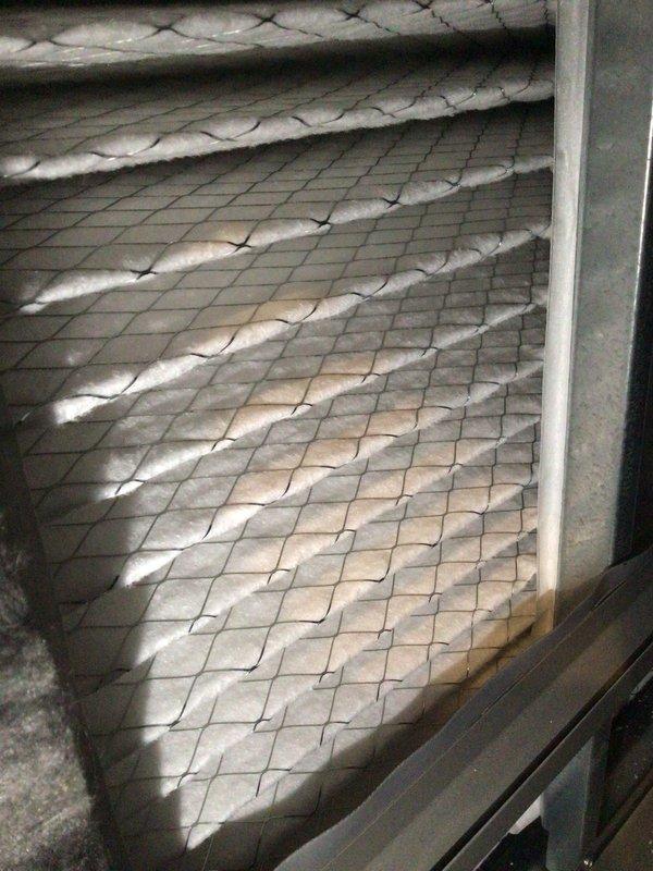 Completed comprehensive cooling system tune-up on residential AC unit located at side of home. Performed standard maintenance protocol including inspection of condenser coil, which showed moderate dust and debris accumulation on aluminum fins, and air filter assessment revealing significant particulate buildup requiring attention. All system components were evaluated per manufacturer specifications to ensure optimal performance for the cooling season.