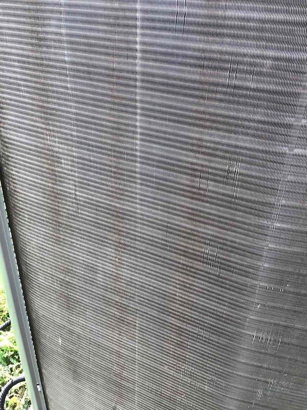 Completed comprehensive cooling system tune-up on residential AC unit located at side of home. Performed standard maintenance protocol including inspection of condenser coil, which showed moderate dust and debris accumulation on aluminum fins, and air filter assessment revealing significant particulate buildup requiring attention. All system components were evaluated per manufacturer specifications to ensure optimal performance for the cooling season.