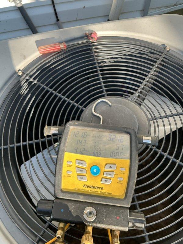 Responded to no cooling complaint on 10+ year old ground-level outdoor unit. Upon arrival, performed diagnostic testing and discovered failed dual-run capacitor preventing compressor and condenser fan operation. Replaced defective capacitor with manufacturer-specified component, restored power, and verified proper amperage draws and system pressures using calibrated gauges. Unit returned to normal cooling operation with all components functioning within specifications.