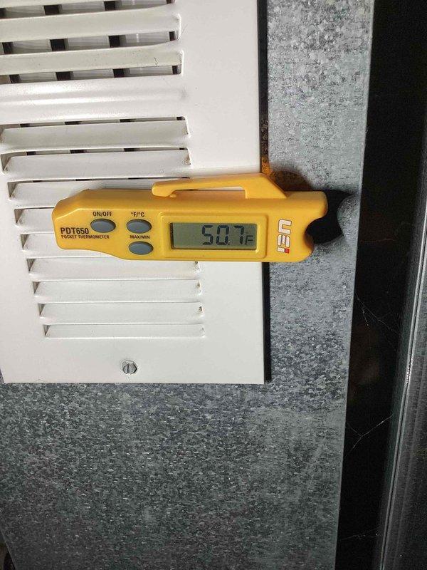 Replaced flexible gas line inside furnace with code-compliant black iron piping and installed kill switch for improved safety. Completed scheduled air conditioning maintenance including system inspection and performance testing. Temperature and electrical readings confirmed proper system operation with supply air temperature at 50.1°F and electrical measurements within normal parameters.