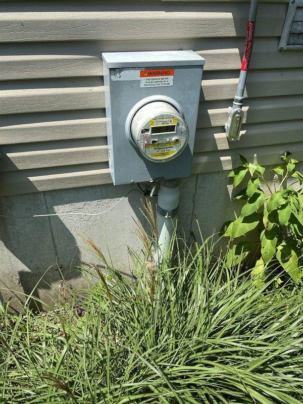 Conducted comprehensive electrical estimate for fixture installation and assessment. Documented existing electrical infrastructure including main circuit breaker panel with dual columns of breakers serving various circuits (bathroom receptacles, oven, master bath, bedrooms, and alarm system), exterior utility meter assembly with digital readout, and associated conduit routing. Photographed panel configuration, labeling system, and exterior meter installation to develop accurate scope of work for proposed fixture upgrades.