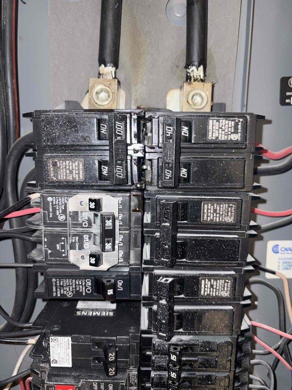 Responded to no-cool call for 11-year-old outdoor condensing unit that was not turning on. Upon arrival, inspected electrical panel and breaker box serving the HVAC system. Found significant dust and debris accumulation throughout the electrical panel, affecting multiple circuit breakers and connections. Verified breaker positions and electrical connections to the condenser unit. Documented electrical panel conditions with photographs showing dusty breakers, wiring configurations, and overall panel status for customer records and safety assessment.