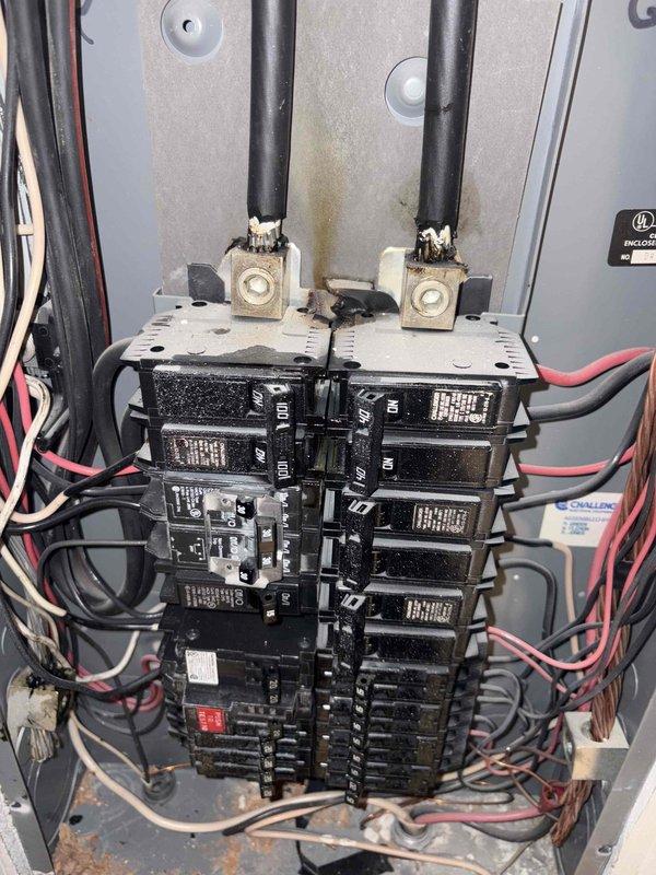 Responded to no-cool call for 11-year-old outdoor condensing unit that was not turning on. Upon arrival, inspected electrical panel and breaker box serving the HVAC system. Found significant dust and debris accumulation throughout the electrical panel, affecting multiple circuit breakers and connections. Verified breaker positions and electrical connections to the condenser unit. Documented electrical panel conditions with photographs showing dusty breakers, wiring configurations, and overall panel status for customer records and safety assessment.