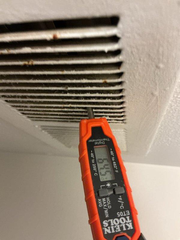 Responded to no cooling complaint on 3-year-old residential air conditioning system. Upon inspection, diagnosed failed run capacitor with visible degradation and incorrect microfarad reading of 7μF. Replaced defective capacitor with proper OEM specification unit, restored all electrical connections, and verified system operation. Measured supply air temperature at 88.5°F prior to repair; confirmed adequate cooling performance and proper amperage draw after capacitor replacement.