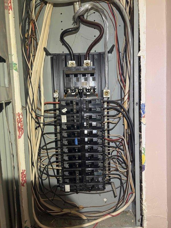Conducted comprehensive electrical assessment for installation of three or more new outlets. Documented existing 200-amp main service panel configuration, noting current circuit breaker arrangement, service entrance conductor routing, and available capacity for additional branch circuits. Evaluated panel condition, wire management, and determined feasibility for expanding electrical distribution system to accommodate requested outlet installations.