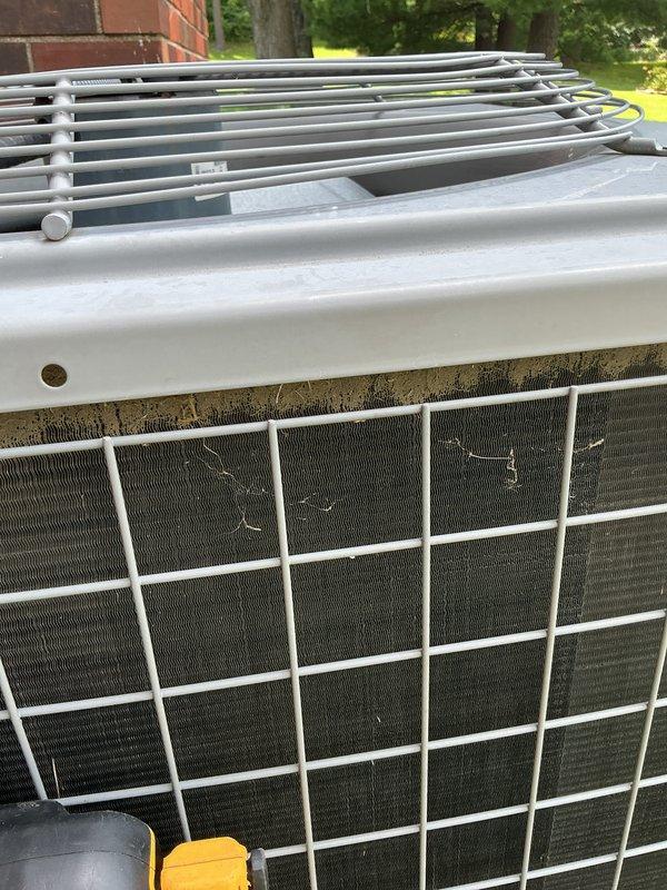 Completed comprehensive cooling system tune-up on ground-level outdoor unit. Performed standard maintenance including inspection of control board wiring and connections, cleaned condenser coil and filter screen which showed accumulation of outdoor debris, verified all electrical components and safety controls operational. System tested and operating within normal parameters.