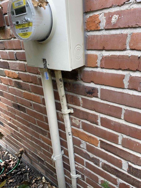 Responded to follow-up service call for recurring 60-amp breaker trips on air conditioning circuit. Inspected electrical panel, AC disconnect with 40-amp fuses, and exterior meter installation to diagnose intermittent tripping issue. Documented utility meter assembly, conduit routing, and exterior connections for further evaluation of circuit loading and potential breaker failure.