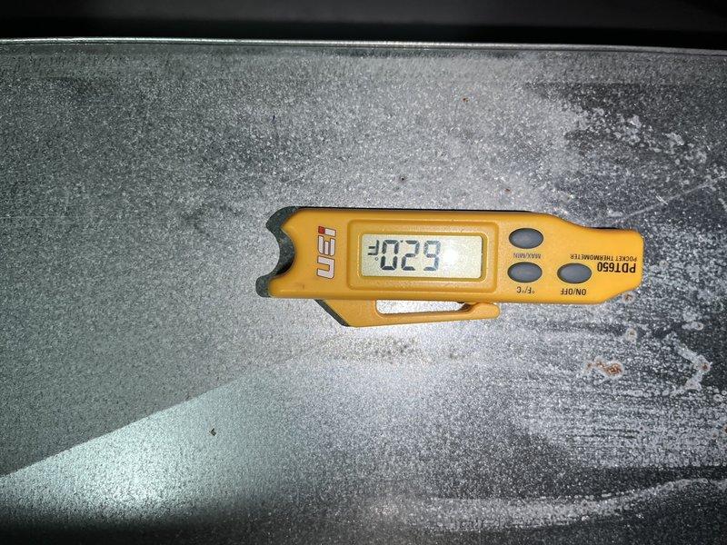Completed comprehensive tune-up on a 19-year-old raised AC unit located in basement area. Performed standard maintenance procedures including system inspection, temperature differential measurements using calibrated instruments, and thorough evaluation of all electrical components including capacitor and motor connections. Unit showed significant dust accumulation on internal surfaces, indicating extended period since last service, but all components were found to be operational with proper wire connections secured.