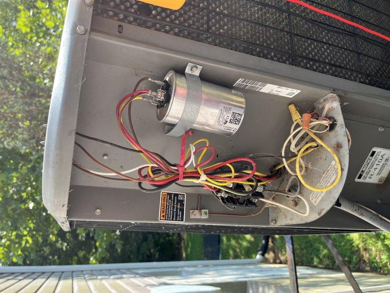 Completed comprehensive tune-up on a 19-year-old raised AC unit located in basement area. Performed standard maintenance procedures including system inspection, temperature differential measurements using calibrated instruments, and thorough evaluation of all electrical components including capacitor and motor connections. Unit showed significant dust accumulation on internal surfaces, indicating extended period since last service, but all components were found to be operational with proper wire connections secured.