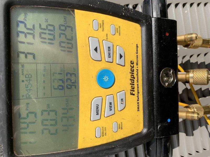 Responded to callback for non-operational air conditioning system on 1-year-old Lennox unit. Upon arrival, performed comprehensive system diagnostics to identify root cause of recurring failure. Utilized Fieldpiece micron gauge and refrigerant manifold to conduct evacuation and pressure testing of the refrigeration circuit. Monitored system vacuum levels and verified proper seal integrity throughout the closed loop. Inspected attic-mounted air handler installation, checking all electrical connections, condensate drainage system, and ductwork connections. Confirmed proper operation of all system components following diagnostic procedures and restored unit to full cooling capacity.