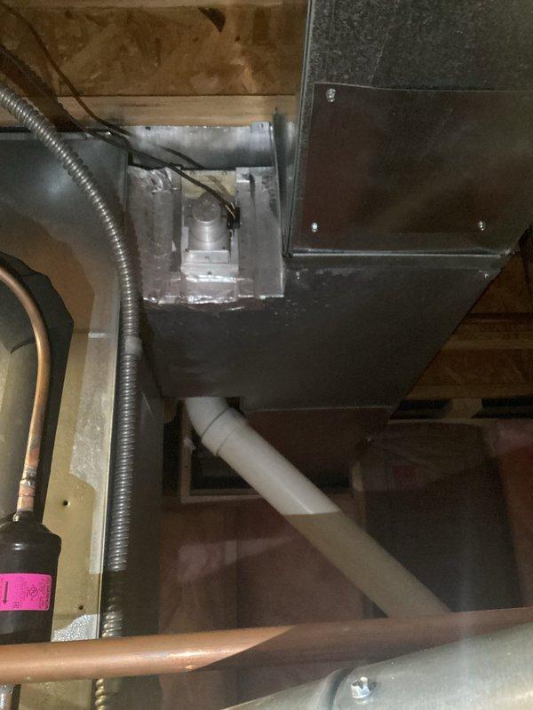 Responded to callback for non-operational air conditioning system on 1-year-old Lennox unit. Upon arrival, performed comprehensive system diagnostics to identify root cause of recurring failure. Utilized Fieldpiece micron gauge and refrigerant manifold to conduct evacuation and pressure testing of the refrigeration circuit. Monitored system vacuum levels and verified proper seal integrity throughout the closed loop. Inspected attic-mounted air handler installation, checking all electrical connections, condensate drainage system, and ductwork connections. Confirmed proper operation of all system components following diagnostic procedures and restored unit to full cooling capacity.
