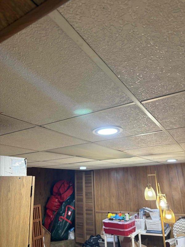 Coordinated with HVAC contractor on initial site visit to assess and plan completion of range hood installation project. Documented existing ceiling configuration with drop ceiling tiles, recessed lighting, and wall finishes to determine final electrical connection requirements for kitchen exhaust system.