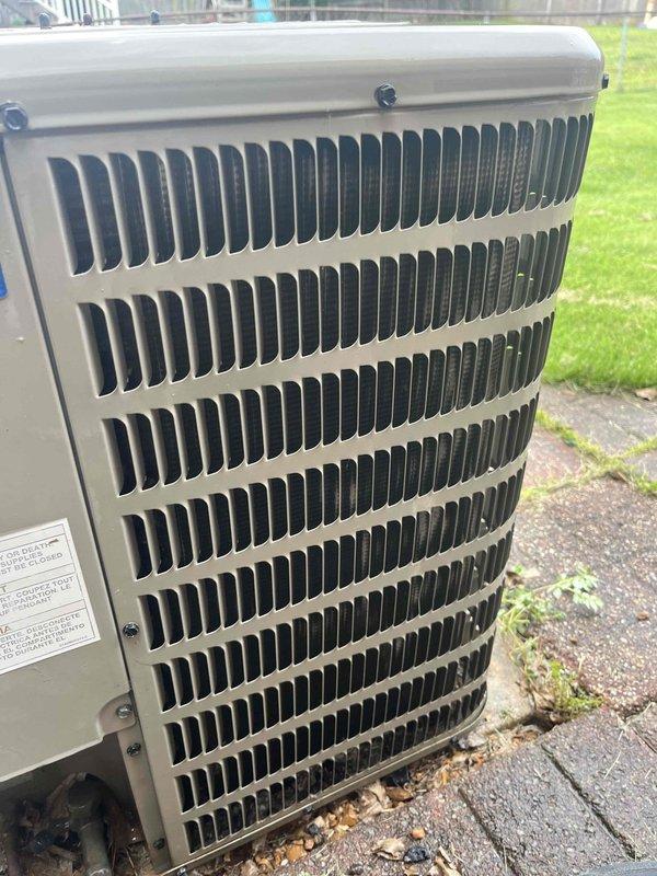 Completed comprehensive cooling maintenance tune-up on a 15-year-old residential air conditioning system. Performed standard preventive maintenance procedures including inspection of outdoor condenser unit, verification of proper airflow through louvered fins, assessment of component condition, and system operational testing. Unit was found to be functioning properly with no immediate repairs required; exterior housing showed typical weathering consistent with age but remained structurally sound with adequate airflow clearance maintained around the installation.