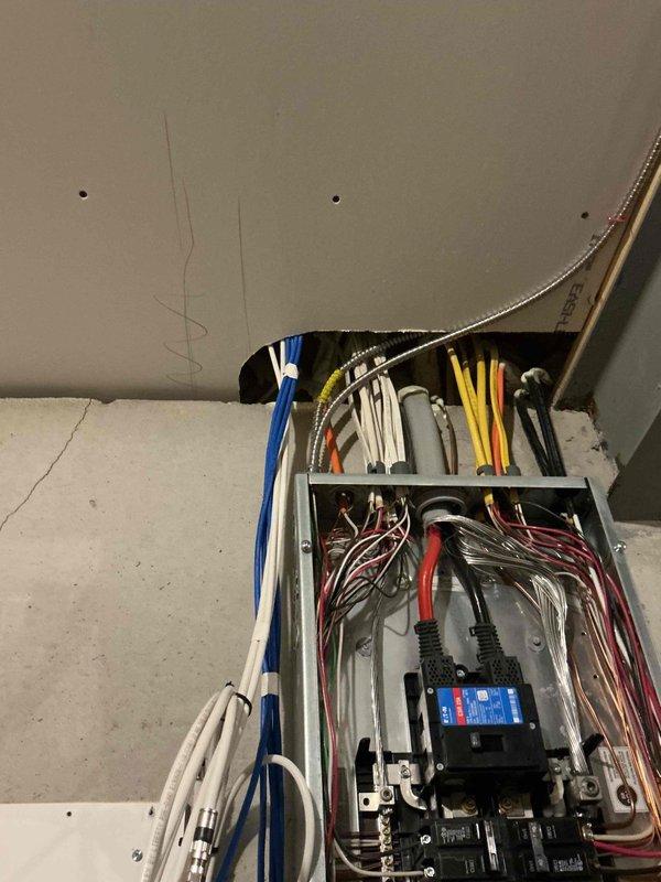 Responded to service call for installation of dedicated electrical outlet for new gas stove in kitchen. Accessed main electrical panel and verified available circuit capacity for new appliance connection. Installed appropriate gauge wiring from panel to kitchen location, ensuring compliance with National Electrical Code requirements for gas range auxiliary power supply. Mounted new grounded outlet receptacle at specified location behind appliance space. Verified proper grounding, tested circuit functionality, and confirmed voltage readings within acceptable parameters. All connections secured and installation completed to code specifications.