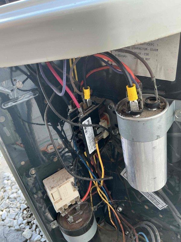 Responded to no-cool call on 10+ year old system with outdoor condenser not operating. Upon inspection, found both fuses in the disconnect blown, indicating electrical fault or component failure. Replaced failed fuses, tested system operation, and verified compressor and condenser fan motor now functioning properly with normal amperage draw.