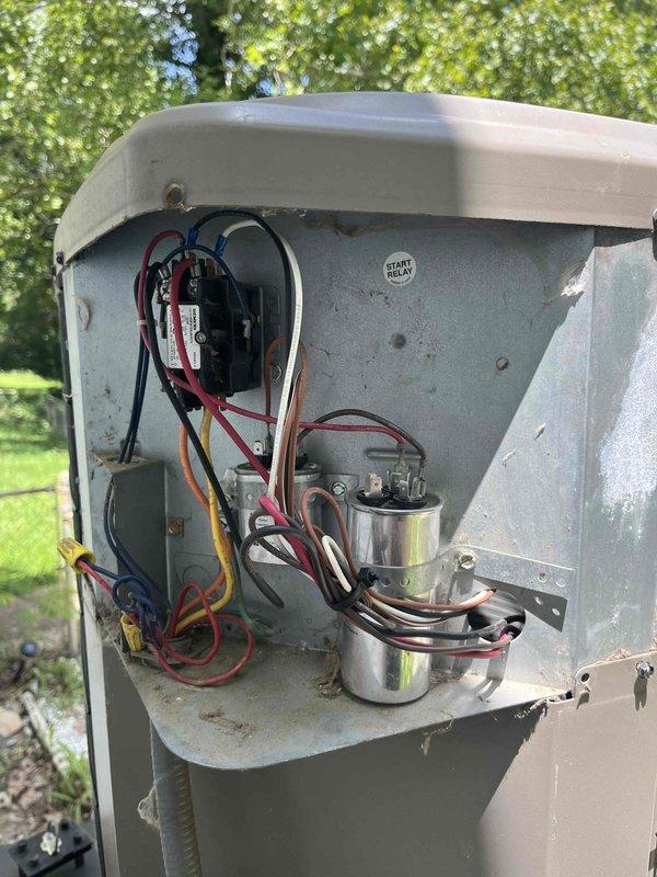 Responded to no-cool complaint on 15-year-old residential air conditioning system. Upon arrival, performed comprehensive diagnostic evaluation of outdoor condenser unit. Inspected electrical components including dual run capacitor, start relay, and associated wiring connections. Verified compressor operation, checked refrigerant pressures, and measured temperature split across evaporator coil. Evaluated condenser fan motor performance and airflow through coil surfaces. Identified system deficiency preventing adequate cooling capacity. Completed necessary repairs to restore proper cooling operation. System tested and confirmed operating within manufacturer specifications upon completion.