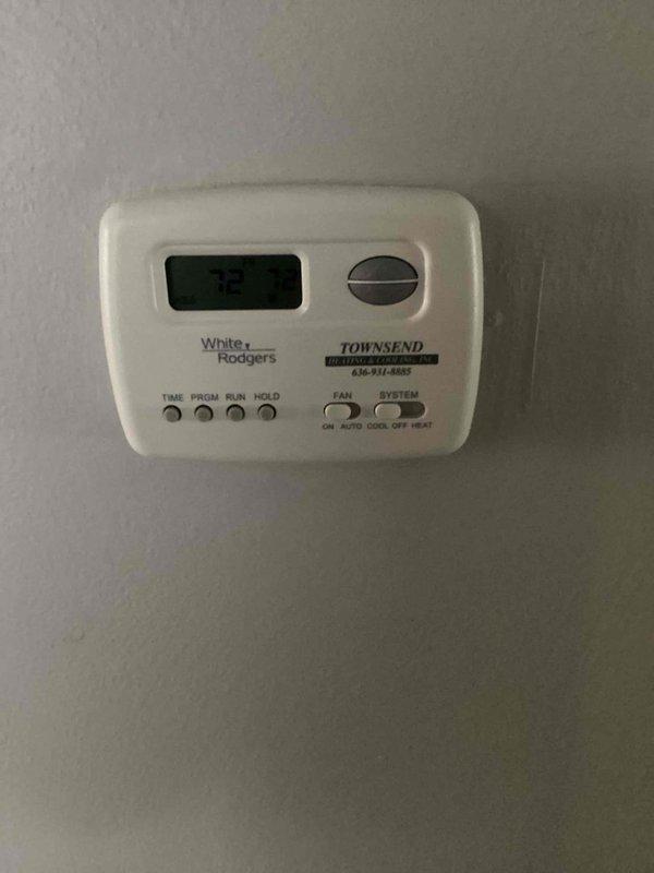 Completed comprehensive air conditioning tune-up on 13-year-old residential cooling system equipped with White-Rodgers thermostat. Performed full preventive maintenance protocol including inspection of all major components, verification of thermostat operation displaying 72 degrees, assessment of furnace and ductwork configuration, and system performance evaluation to ensure optimal readiness for upcoming cooling season.