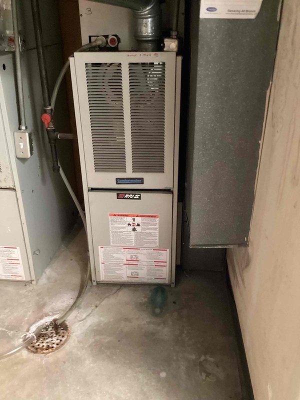 Completed comprehensive air conditioning tune-up on 13-year-old residential cooling system equipped with White-Rodgers thermostat. Performed full preventive maintenance protocol including inspection of all major components, verification of thermostat operation displaying 72 degrees, assessment of furnace and ductwork configuration, and system performance evaluation to ensure optimal readiness for upcoming cooling season.