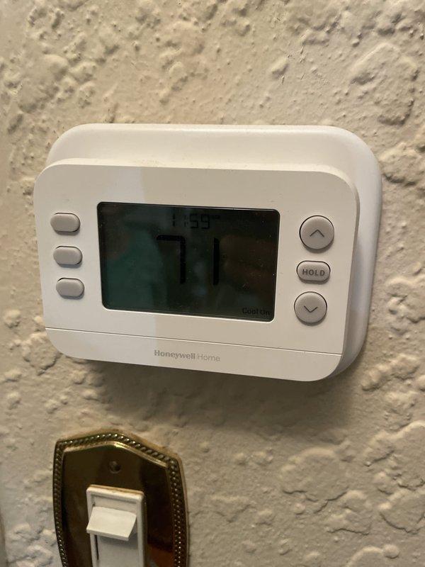 Responded to callback for condensation leaking from attic unit into garage. Verified thermostat settings with fan running and AC off as previously instructed. Inspected Lennox condensing unit outside and attic air handler; checked primary and secondary drain lines for proper flow and blockages. No active leaking observed at time of visit; system operational and draining correctly through primary condensate line.