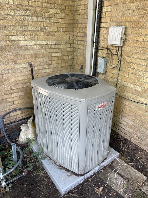 Responded to callback for condensation leaking from attic unit into garage. Verified thermostat settings with fan running and AC off as previously instructed. Inspected Lennox condensing unit outside and attic air handler; checked primary and secondary drain lines for proper flow and blockages. No active leaking observed at time of visit; system operational and draining correctly through primary condensate line.