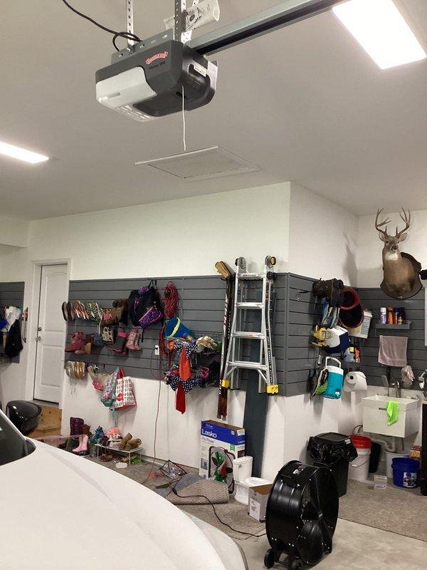 Responded to service call for garage ceiling fan with no airflow. Inspected large industrial-style ceiling fan and verified motor operation. Determined fan was functioning properly but rotating in reverse direction, pulling air upward instead of circulating downward. Reversed fan direction using directional switch to correct airflow pattern and confirmed proper air circulation throughout garage space. Provided quote for installation of two exterior GFCI-protected outlets per customer request.