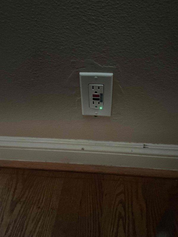 Responded to a no-power service call affecting the living room, bathroom, and second bedroom following a GFCI installation that caused a breaker to trip. Inspected the newly installed GFCI receptacle and verified proper wiring connections and functionality, confirming the green LED indicator showed the device was operational. Accessed the main electrical panel, identified the tripped breaker serving the affected circuits, and reset the breaker to restore power to all three rooms.