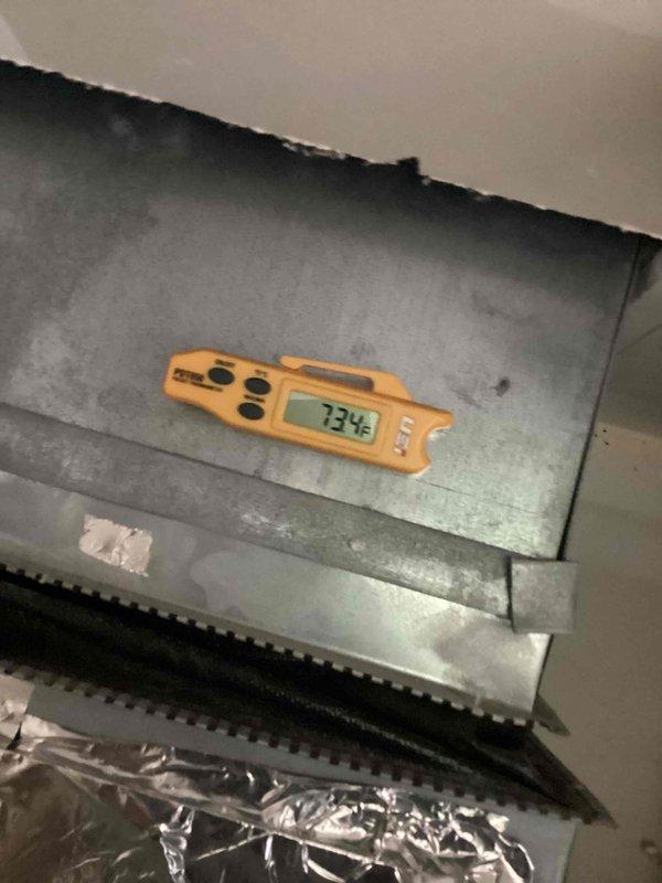 Responded to water leak complaint from 10-year-old air conditioning unit located in garage. Upon arrival, performed system inspection and temperature diagnostics on supply ductwork, recording readings of 78.8°F and 73°F at various points along the metal duct assembly. Identified source of moisture concern and assessed overall system operation to determine appropriate corrective action.