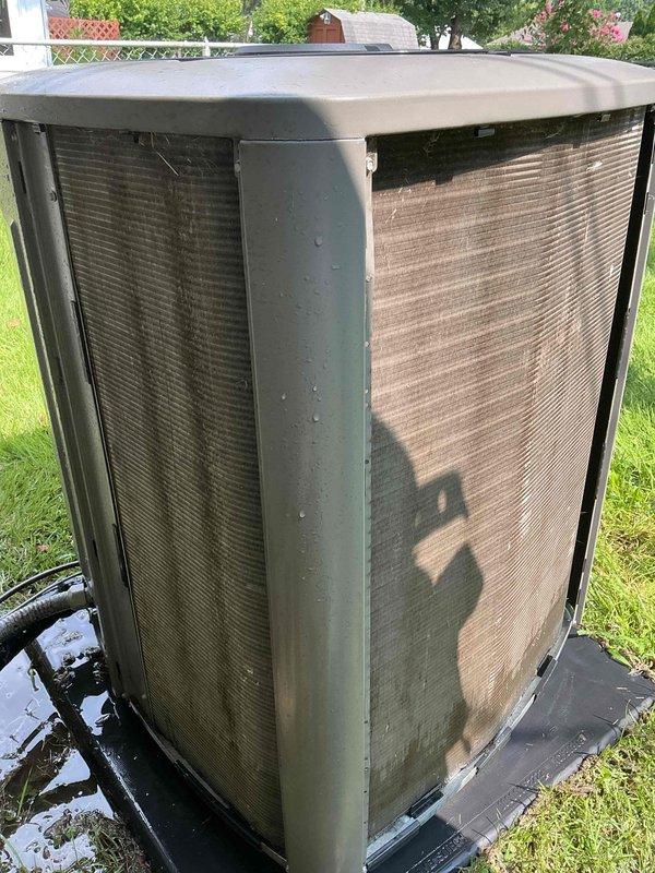 Responded to no cooling complaint on residential air conditioning system less than 10 years old located behind property. Upon arrival, performed diagnostic evaluation of outdoor condenser unit and system operation. Unit showed signs of normal outdoor environmental exposure with weathering on metal grilles and mesh panels. Inspected refrigerant line connections, electrical components, and overall system condition. Advised customer on proper thermostat operation and system settings to achieve desired temperature setpoint. System found to be operational with no mechanical failures identified. Provided guidance on unit maintenance and proper operation procedures.
