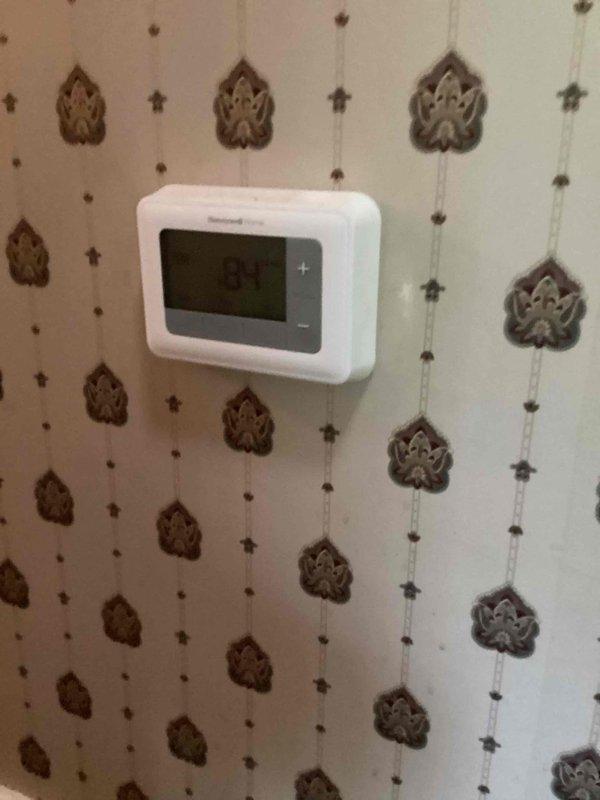 Responded to no cooling call on 17-year-old ground-level unit located in basement. Upon arrival, verified thermostat display showing 84°F with system running but failing to provide adequate cooling. Performed diagnostic evaluation of HVAC system to identify cause of cooling failure and assessed overall system condition to determine necessary repairs for restoring proper operation.