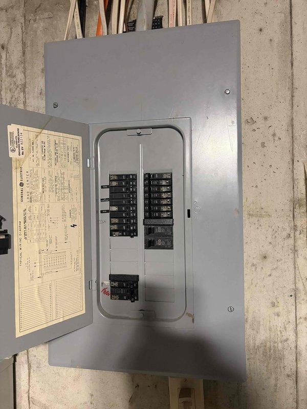 Responded to service call for non-functioning outlets in two bathrooms and exterior locations. Upon arrival, verified that no circuit breakers were tripped in the main electrical panel. Conducted comprehensive inspection of the electrical distribution system, including examination of the main breaker panel and exterior meter assembly. Inspected all circuit breakers for proper operation and verified panel integrity. Documented existing electrical infrastructure conditions, including the main service panel mounted in utility area and exterior meter installation showing signs of weathering and corrosion on enclosure. Identified potential issues requiring further investigation to isolate the cause of outlet failures in affected areas.