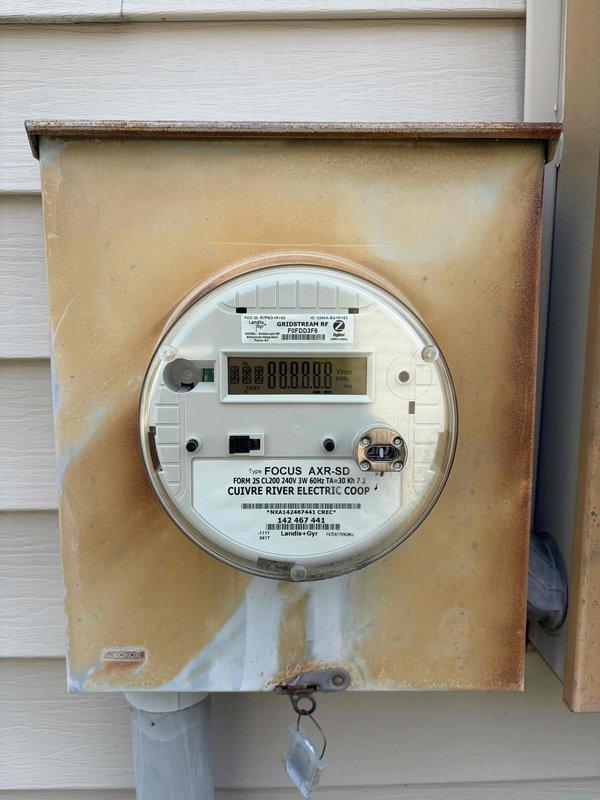 Responded to service call for non-functioning outlets in two bathrooms and exterior locations. Upon arrival, verified that no circuit breakers were tripped in the main electrical panel. Conducted comprehensive inspection of the electrical distribution system, including examination of the main breaker panel and exterior meter assembly. Inspected all circuit breakers for proper operation and verified panel integrity. Documented existing electrical infrastructure conditions, including the main service panel mounted in utility area and exterior meter installation showing signs of weathering and corrosion on enclosure. Identified potential issues requiring further investigation to isolate the cause of outlet failures in affected areas.