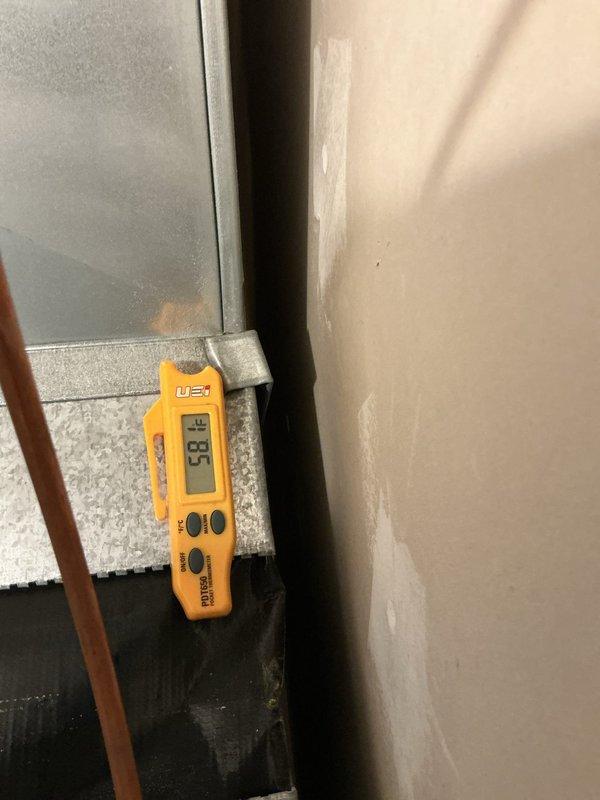 Responded to urgent no-cool call with active water leak on 3-year-old Lennox system. Upon arrival, discovered condensate drain line blockage causing water overflow from unit. Cleared obstruction from drain line and verified proper drainage flow through PVC condensate piping system. Inspected evaporator coil and drain pan for damage; found no cracks or structural issues. Measured temperature differential across coil at 15.3°F, confirming restored cooling operation. Tested system through complete cycle to ensure leak resolved and unit operating within normal parameters. System returned to full cooling capacity with no further water discharge issues.