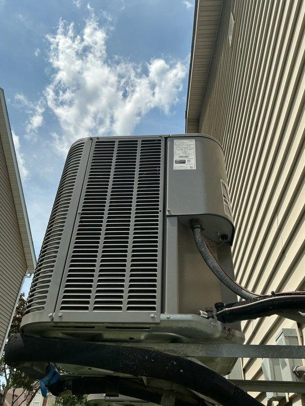 Responded to service call for loose screw on outdoor AC condenser unit. Upon arrival, inspected wall-mounted unit (U10) elevated on metal bracket mounting system on side of building. Secured loose hardware on unit casing and verified all mounting brackets and fasteners were properly tightened to ensure stable installation. Performed visual inspection of condenser exterior, refrigerant lines, and electrical conduit connections—all components found in satisfactory condition with no signs of damage or deterioration.