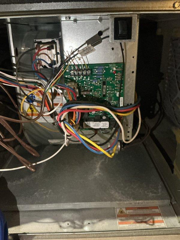 Completed comprehensive cooling tune-up on two HVAC units located at rear of property. Performed standard maintenance procedures including inspection of control boards, electrical connections, and internal components on both systems. All wiring connections verified secure, circuit boards inspected for proper operation, and units confirmed operational with no deficiencies noted.
