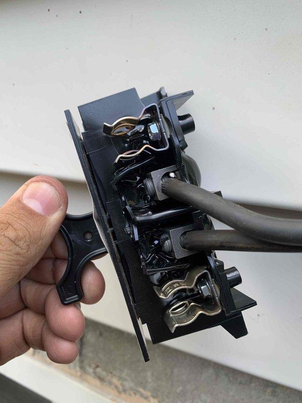 Responded to no cooling complaint on 4-month-old residential air conditioning unit blowing warm air. Upon inspection, found failed contactor preventing compressor operation. Removed defective contactor with burnt contacts and replaced with new component. Verified proper electrical connections at outdoor disconnect, tested system operation, and confirmed unit now cooling properly under first-year warranty coverage.