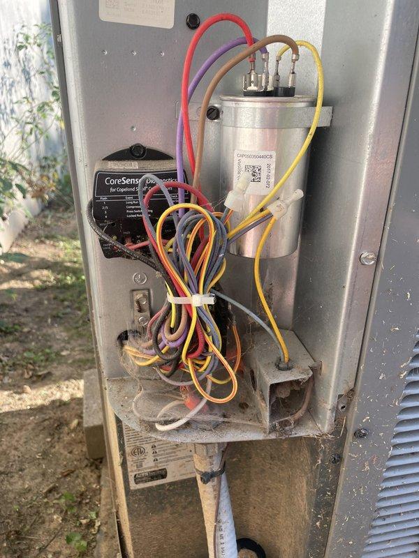 Responded to no cooling complaint on 7-year-old outdoor unit. Upon inspection, found failed dual run capacitor with visible signs of deterioration. Replaced defective capacitor with manufacturer-approved replacement, restored power, and verified proper system operation with all electrical connections secure. Unit cooling normally at time of departure.