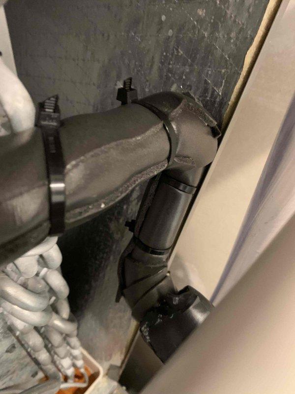 Responded to callback for upstairs AC unit with ongoing water discharge issue after previous service attempts. Upon inspection, found heavily soiled evaporator coil and condensate drain system requiring attention. Cleaned accumulated dust and debris from unit components, cleared condensate line blockage causing water overflow down equipment, verified proper drainage flow, and tested system operation to ensure issue resolution.