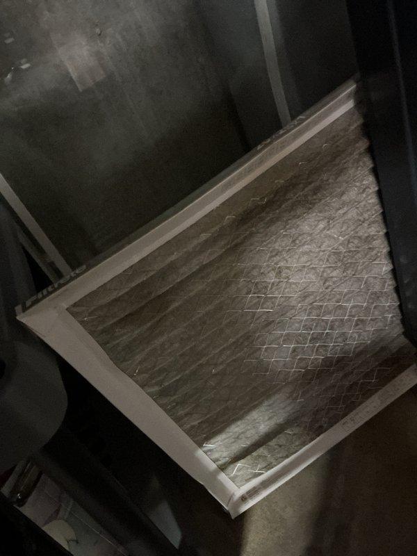 Completed comprehensive cooling maintenance on a 9-year-old air conditioning system found in proper working condition. Performed standard AC tune-up protocol including inspection of blower motor assembly, verification of motor shaft alignment, and examination of housing components for secure mounting and proper sealing. Inspected air filter which showed moderate dust and debris accumulation consistent with normal operation; filter condition documented photographically. All system components operating within normal parameters at time of service.