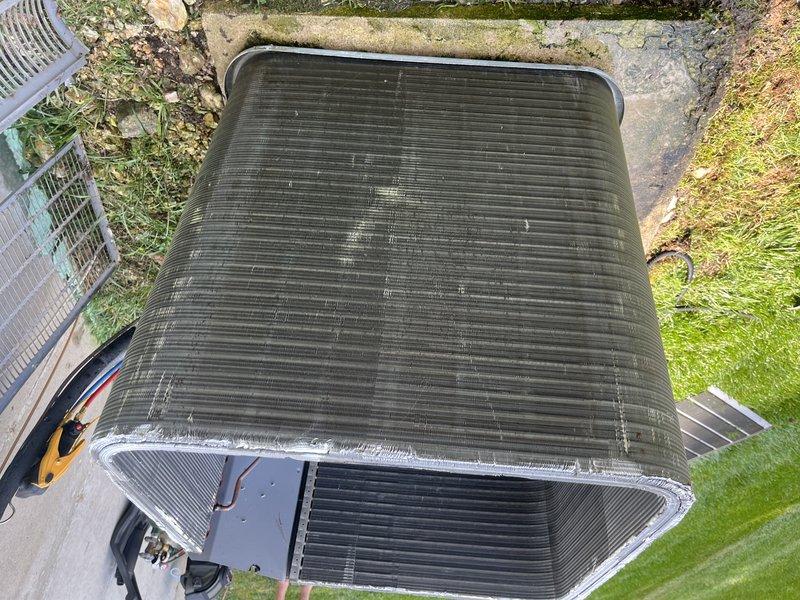 Replaced failed compressor on outdoor condensing unit with serial number 1917e41199. Recovered refrigerant from system, removed and retained old compressor for warranty claim purposes, installed new replacement compressor, evacuated system to proper vacuum levels, and recharged unit with appropriate refrigerant type and quantity. Verified proper operation of all system components, confirmed adequate airflow across condenser coil, and documented installation with photographs of both old and new compressor as required. Unit tested and left operational with normal temperature differential and pressures within manufacturer specifications.
