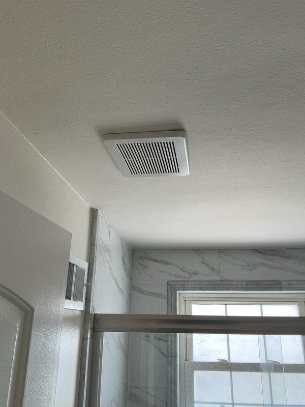 Completed installation of bathroom exhaust fan with proper ventilation grille and indicator light, inspected and serviced bathroom lighting fixture, tested and verified proper operation of two living room electrical outlets, and addressed exterior yard light post electrical concerns. All work performed to code specifications with functionality confirmed upon completion.