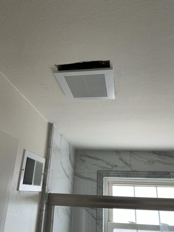 Completed installation of bathroom exhaust fan with proper ventilation grille and indicator light, inspected and serviced bathroom lighting fixture, tested and verified proper operation of two living room electrical outlets, and addressed exterior yard light post electrical concerns. All work performed to code specifications with functionality confirmed upon completion.