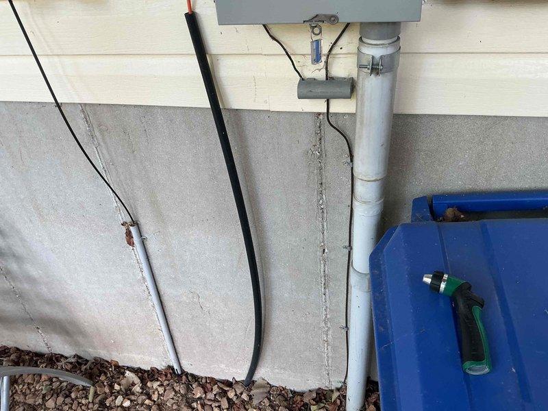Responded to service call for outdoor lighting circuit breaker repeatedly tripping in basement electrical panel. Diagnosed and resolved issue with 8-12 breaker controlling exterior deck lighting system. Inspected outdoor lighting fixtures and associated wiring along wooden deck area, verified proper operation of circuit, and confirmed breaker stability after repair.
