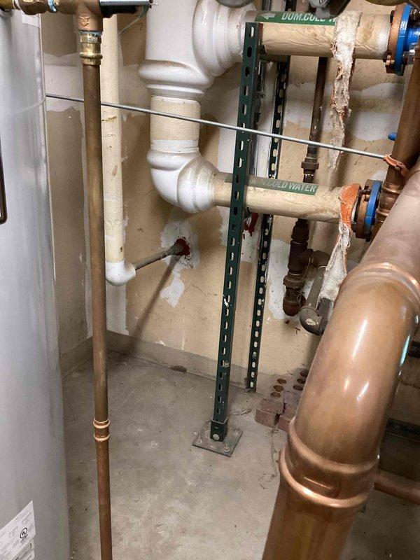 Provided electrical estimate for installation of dedicated circuit to support mini split system. Assessed existing electrical panel capacity and determined routing requirements through utility/mechanical space. Evaluated panel configuration showing adequate breaker positions available and confirmed compatibility for new circuit installation to accommodate mini split unit power requirements.