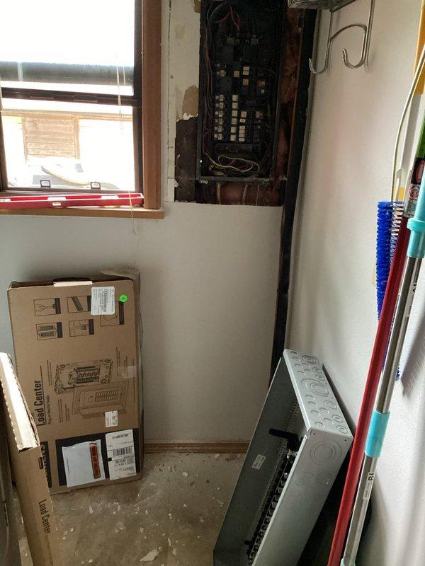 Completed full electrical panel replacement in utility room, including installation of new circuit breaker panel with proper surge protection and updated grounding system. Removed existing panel box and installed modern distribution panel with multiple circuit breakers to meet current electrical code requirements, ensuring safe and reliable power distribution throughout the property.